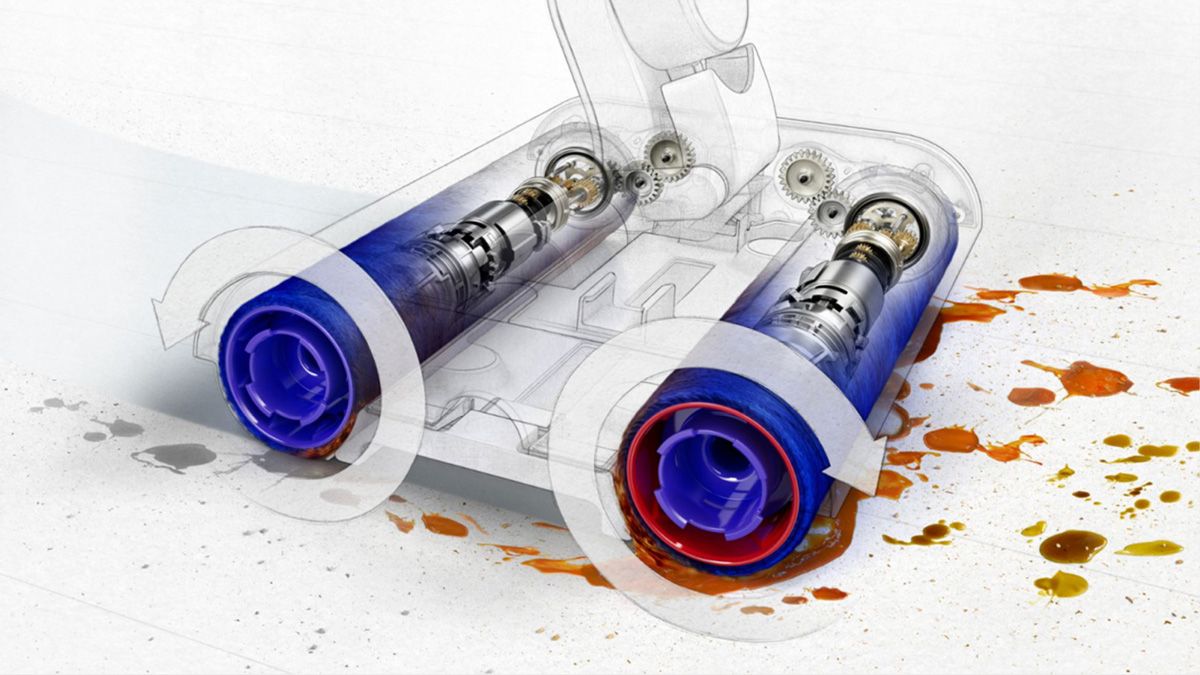 An illustration showing the Dyson counter-rotating rollers cleaning liquid spills, showing the gears moving inside.