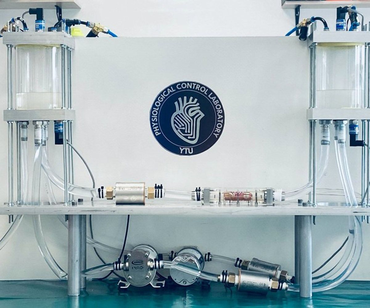 Laboratory setup showing testing of the LVAD. The LVAD is in a clear tube on the right side.