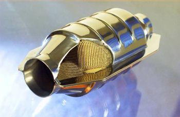 Figure 1. An automotive emissions control catalyst with the outer shell cut to show the inner construction.