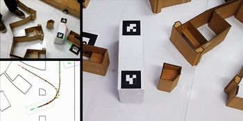 Figure 6. The CPRHS vehicle prototype navigating a cardboard model of the Tokamak building.