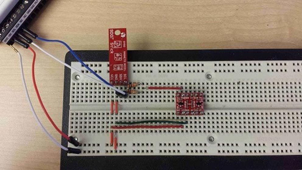 An NI-8452 I2C interface module being used to collect data from an Analog Devices ADXL345 accelerometer, which is connected on a prototyping breadboard.